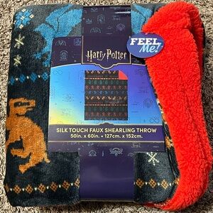 Warner Bros. Harry Potter Hogwarts Silk Touch Faux ShearlinThrow Black Red Blue